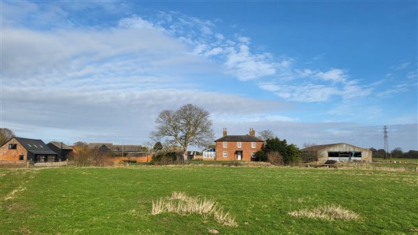 units surrounded by fields